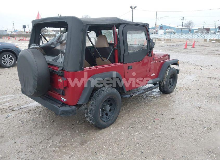 Photo 4 of 1999 Jeep Wrangler SE (VIN 1J4FY29P6XP408738)