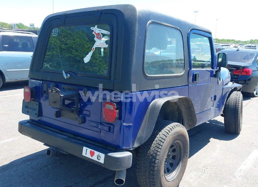 Photo 4 of 1997 Jeep Wrangler SE (VIN 1J4FY29P8VP400766)
