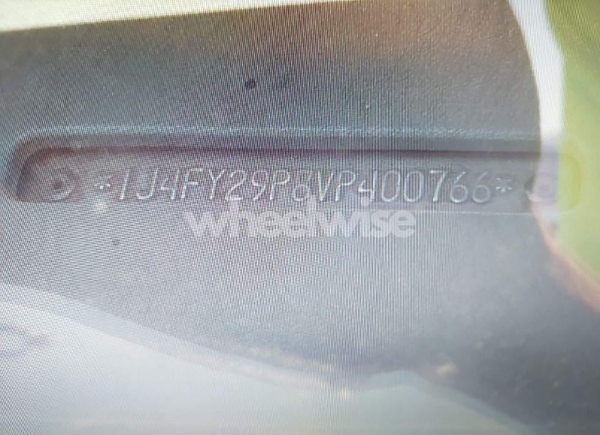 Photo 9 of 1997 Jeep Wrangler SE (VIN 1J4FY29P8VP400766)