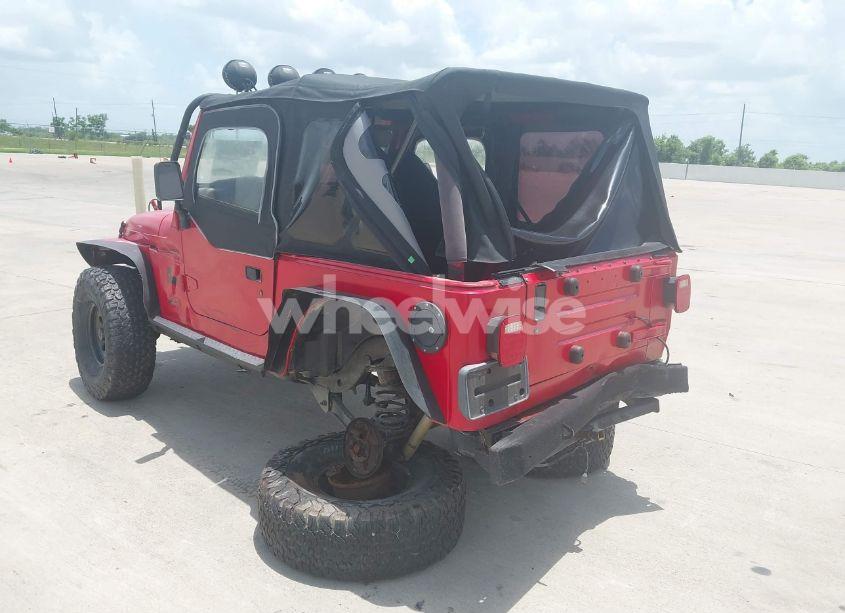 Photo 3 of 1999 Jeep Wrangler SE (VIN 1J4FY29P8XP464616)