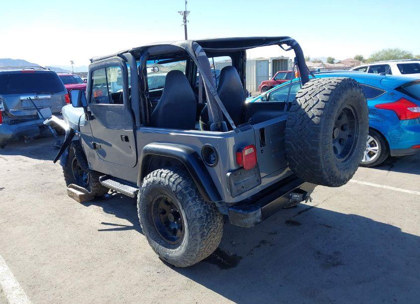 Photo 3 of 1999 Jeep Wrangler SE (VIN 1J4FY29P9XP479416)