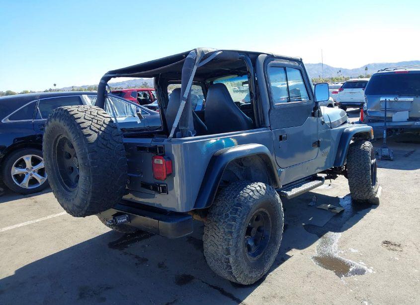 Photo 4 of 1999 Jeep Wrangler SE (VIN 1J4FY29P9XP479416)