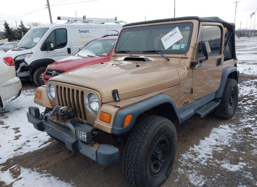Photo 2 of 1999 Jeep Wrangler SE (VIN 1J4FY29PXXP408211)