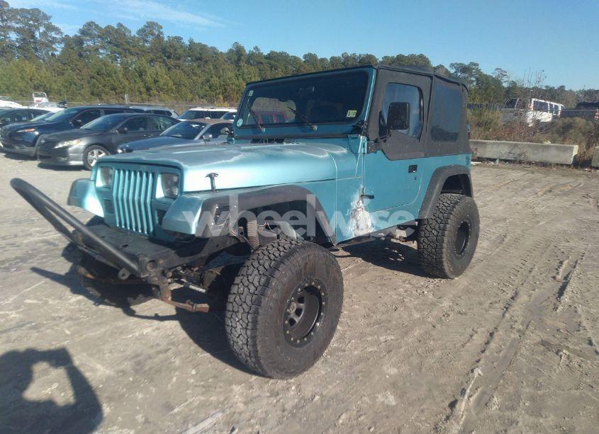 Photo 2 of 1995 Jeep Wrangler / YJ SE (VIN 1J4FY29SXSP216056)