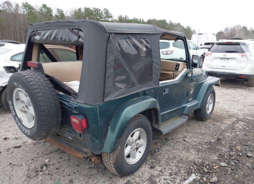 Photo 4 of 1999 Jeep Wrangler SAHARA (VIN 1J4FY49S7XP470312)