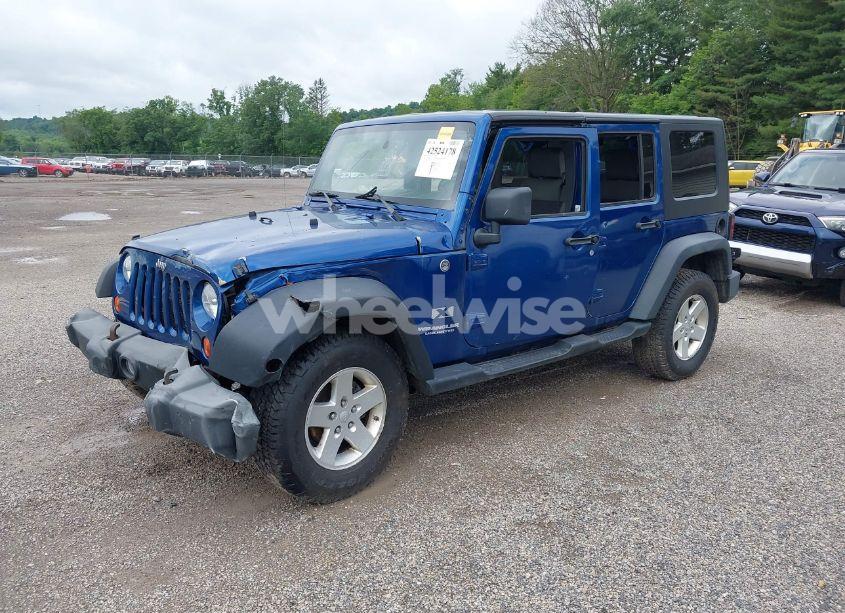 Photo 2 of 2009 Jeep Wrangler UNLIMITED X (VIN 1J4GA39119L761487)