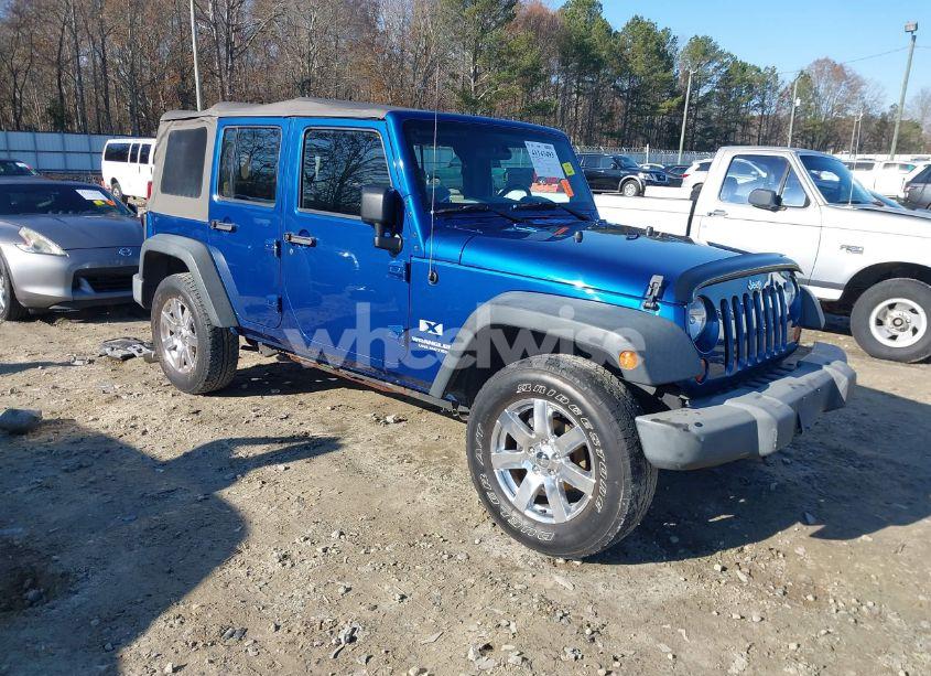 2009 Jeep Wrangler UNLIMITED X (VIN 1J4GA39199L758661) main photo