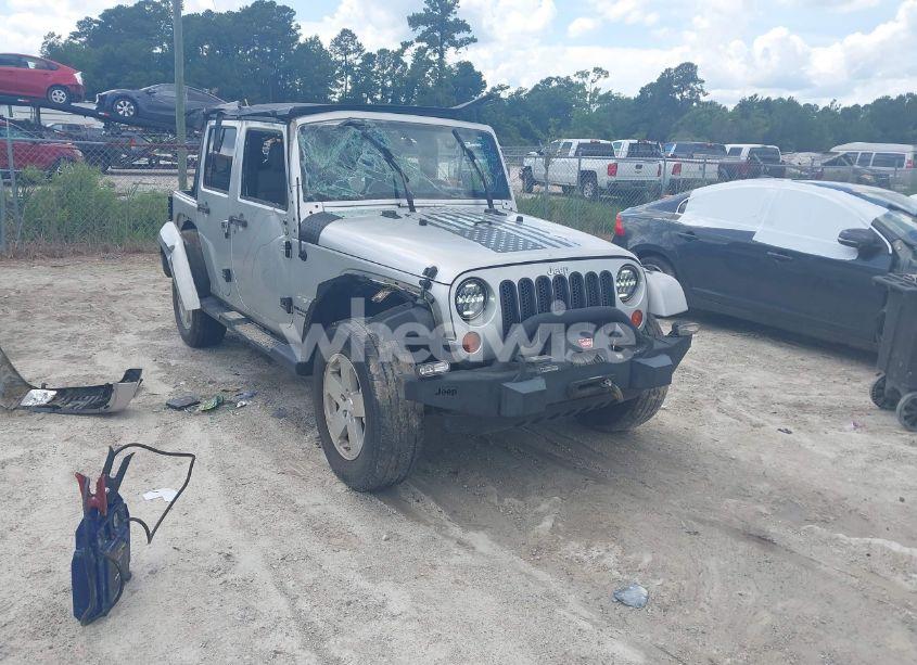 2009 Jeep Wrangler UNLIMITED SAHARA (VIN 1J4GA59149L720511) main photo