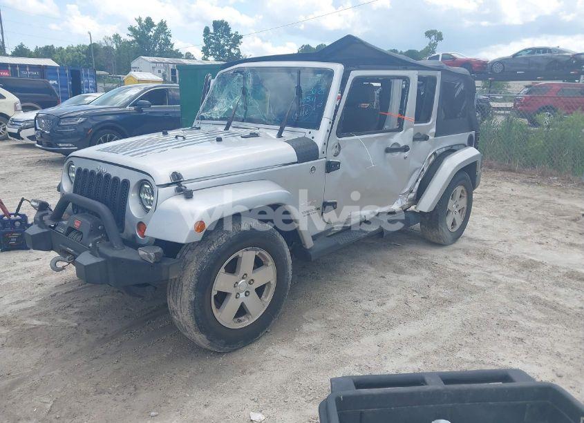 Photo 2 of 2009 Jeep Wrangler UNLIMITED SAHARA (VIN 1J4GA59149L720511)