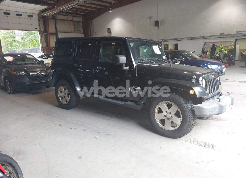 2009 Jeep Wrangler UNLIMITED SAHARA (VIN 1J4GA59169L781746) main photo