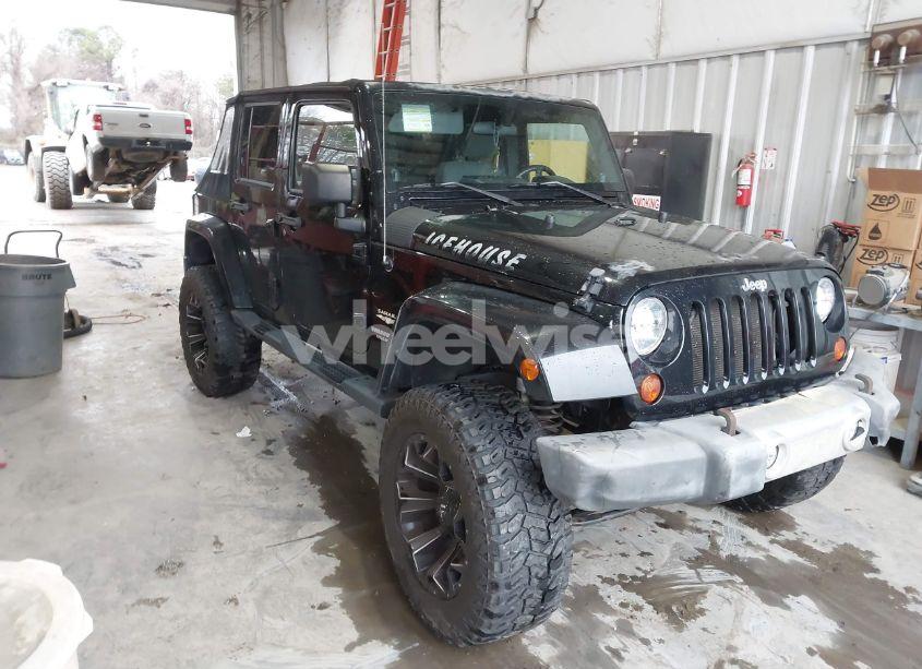 2009 Jeep Wrangler UNLIMITED SAHARA (VIN 1J4GA59179L719384) main photo