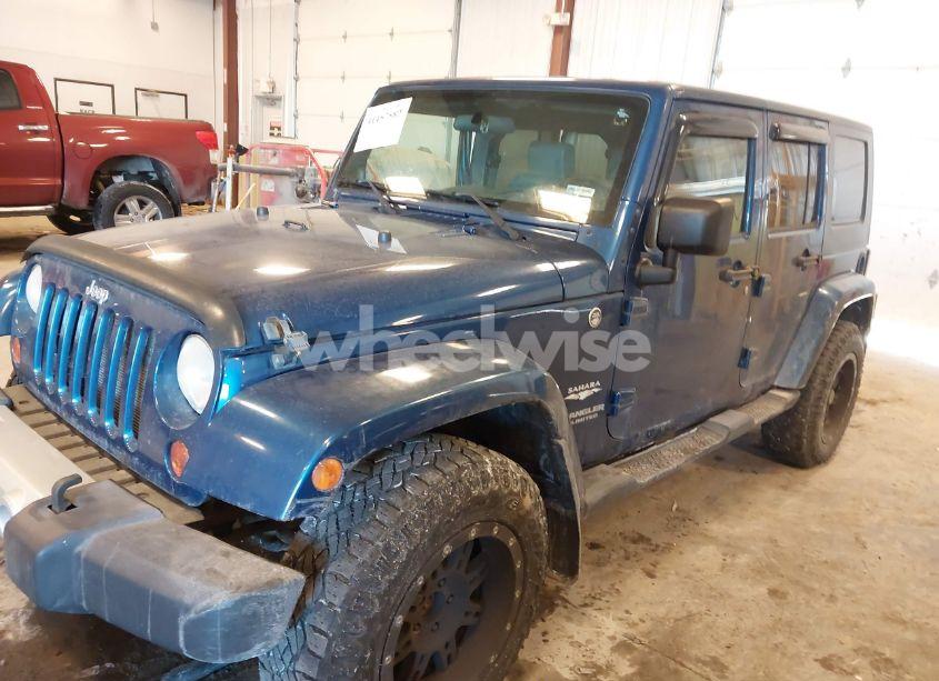Photo 2 of 2009 Jeep Wrangler UNLIMITED SAHARA (VIN 1J4GA59189L712301)