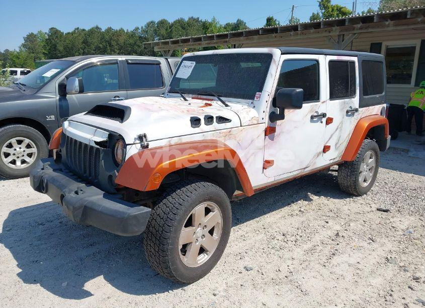 Photo 2 of 2011 Jeep Wrangler UNLIMITED SAHARA (VIN 1J4HA5H12BL502191)