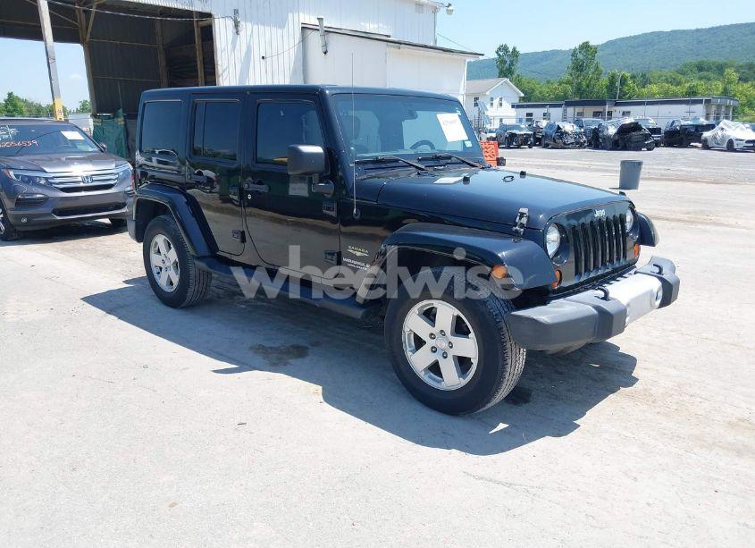 2011 Jeep Wrangler UNLIMITED SAHARA (VIN 1J4HA5H12BL619544) main photo