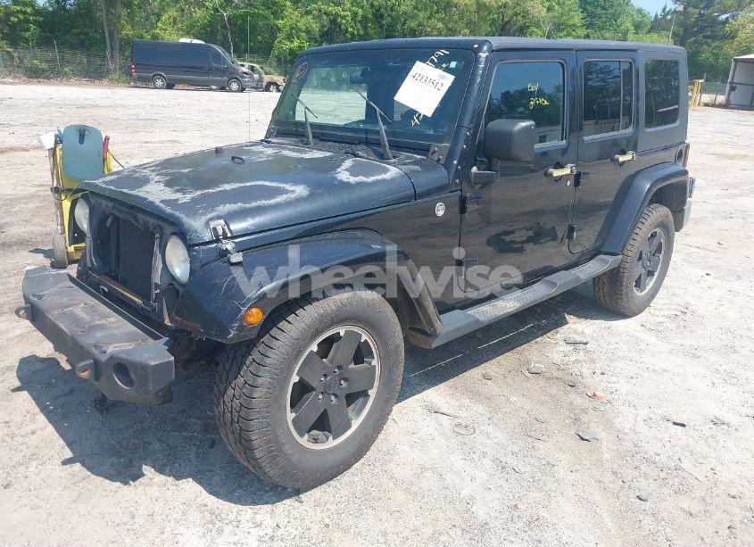 Photo 2 of 2010 Jeep Wrangler UNLIMITED SAHARA (VIN 1J4HA5H16AL145869)