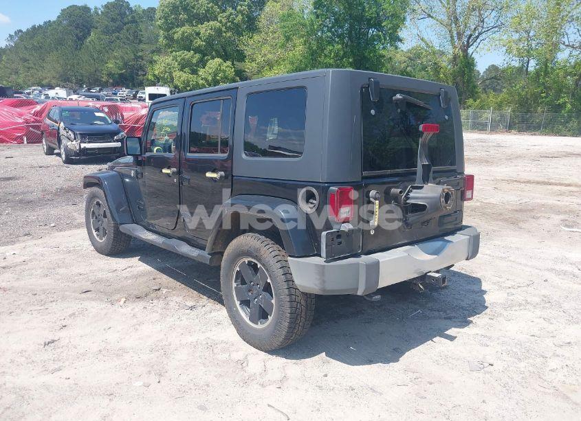 Photo 3 of 2010 Jeep Wrangler UNLIMITED SAHARA (VIN 1J4HA5H16AL145869)
