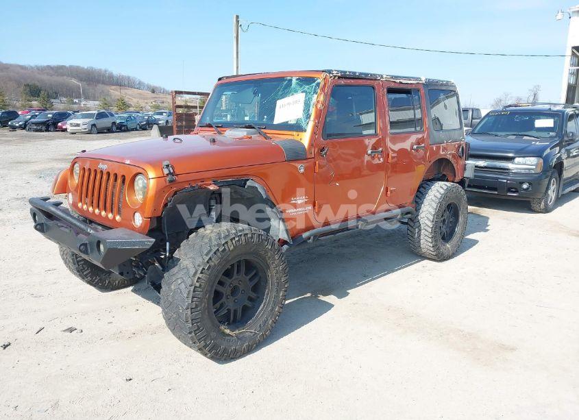 Photo 2 of 2011 Jeep Wrangler UNLIMITED SAHARA (VIN 1J4HA5H17BL509444)
