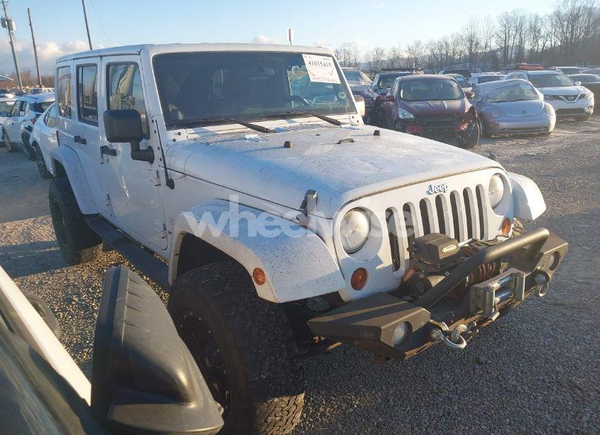 2011 Jeep Wrangler UNLIMITED SAHARA (VIN 1J4HA5H1XBL557374) main photo