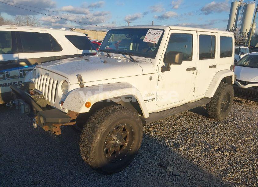 Photo 2 of 2011 Jeep Wrangler UNLIMITED SAHARA (VIN 1J4HA5H1XBL557374)