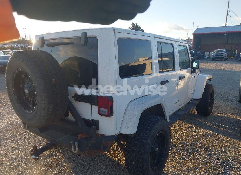 Photo 4 of 2011 Jeep Wrangler UNLIMITED SAHARA (VIN 1J4HA5H1XBL557374)