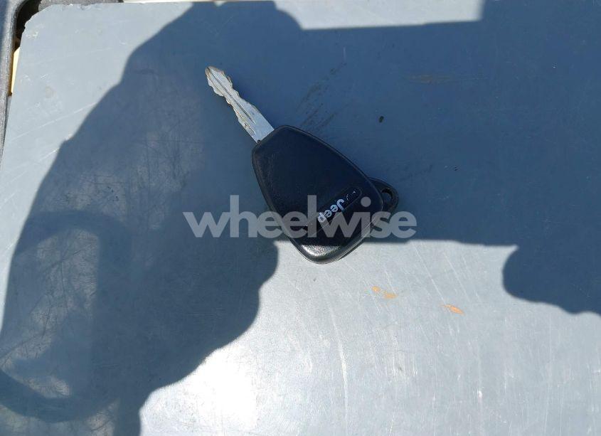 Photo 11 of 2011 Jeep Compass (VIN 1J4NF1FB3BD154601)