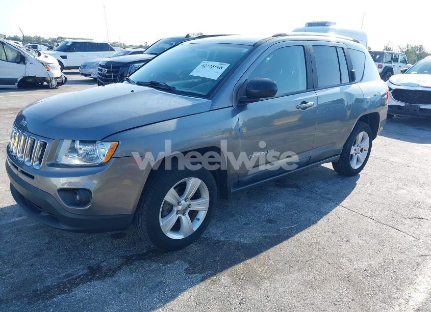 Photo 2 of 2011 Jeep Compass (VIN 1J4NT1FA4BD213994)