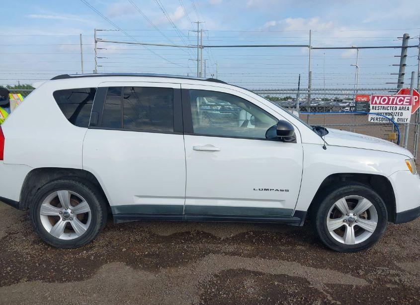Photo 13 of 2011 Jeep Compass (VIN 1J4NT1FA4BD289957)