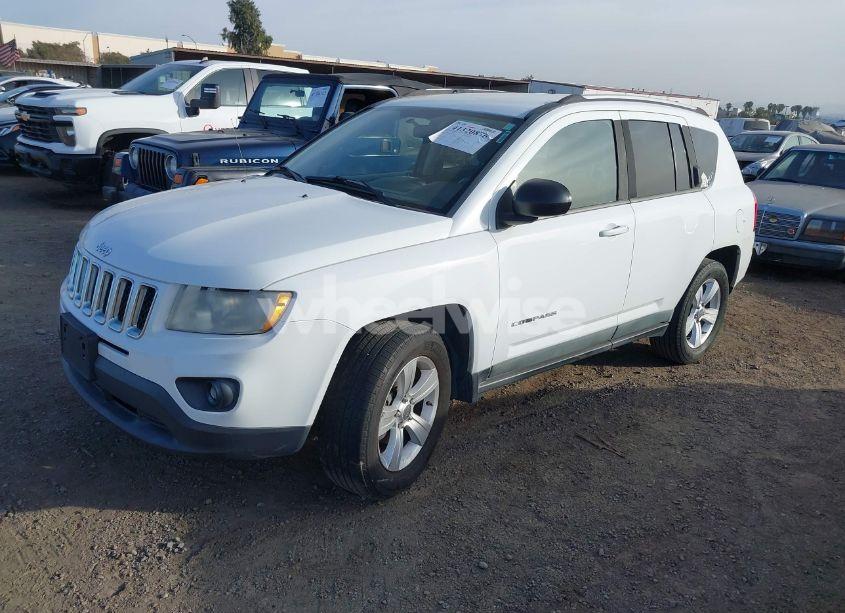Photo 2 of 2011 Jeep Compass (VIN 1J4NT1FA5BD289644)