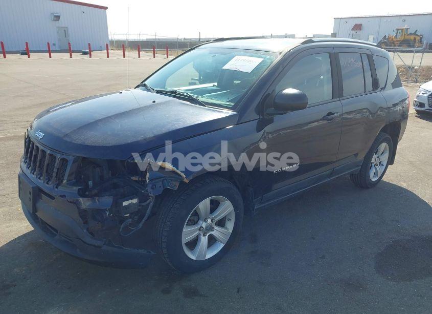 Photo 2 of 2011 Jeep Compass (VIN 1J4NT1FA7BD208658)