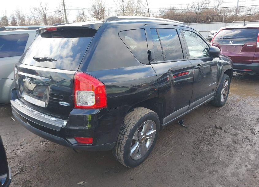 Photo 4 of 2011 Jeep Compass (VIN 1J4NT1FAXBD138718)