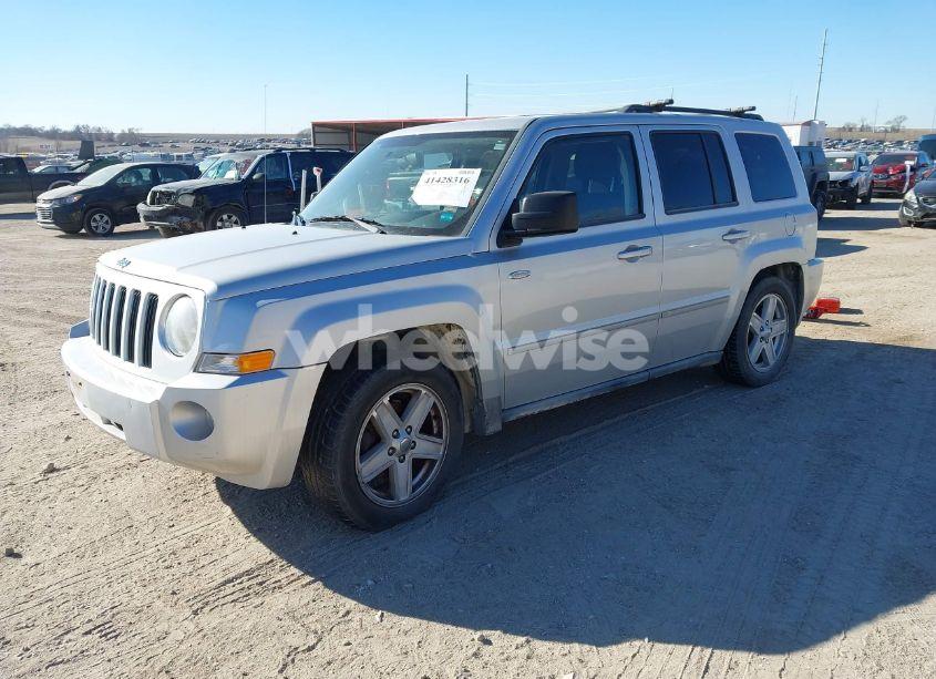 Photo 2 of 2010 Jeep Patriot SPORT (VIN 1J4NT1GA4AD638192)