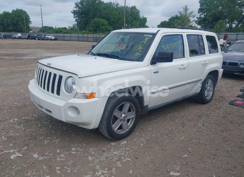 Photo 2 of 2010 Jeep Patriot SPORT (VIN 1J4NT1GA8AD621184)