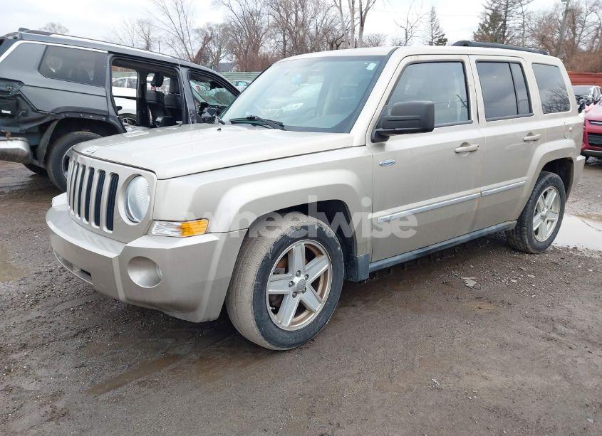 Photo 2 of 2010 Jeep Patriot SPORT (VIN 1J4NT1GBXAD634947)