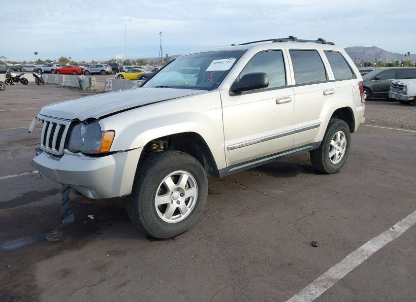 Photo 2 of 2010 Jeep Grand CHEROKEE LAREDO (VIN 1J4RR4GTXAC153323)