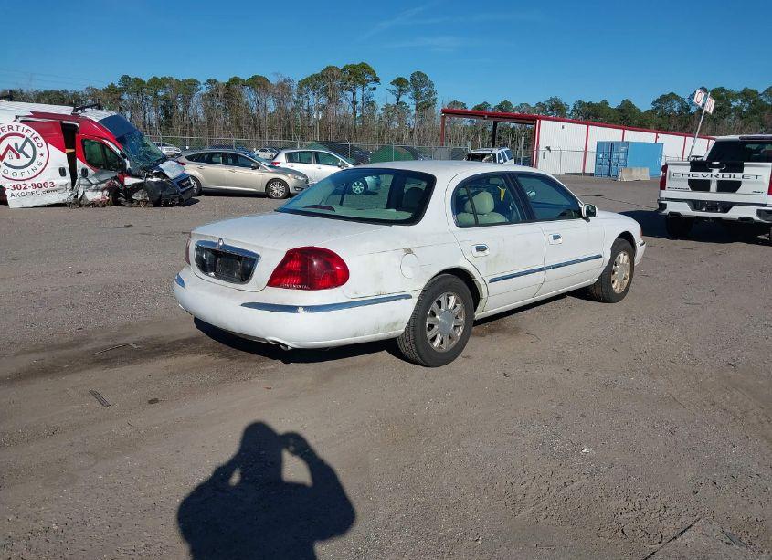 Photo 4 of 2002 Lincoln Continental (VIN 1LNHM97V02Y646300)