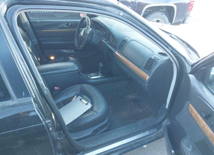 Photo 5 of 1999 Lincoln Continental (VIN 1LNHM97V0XY666957)