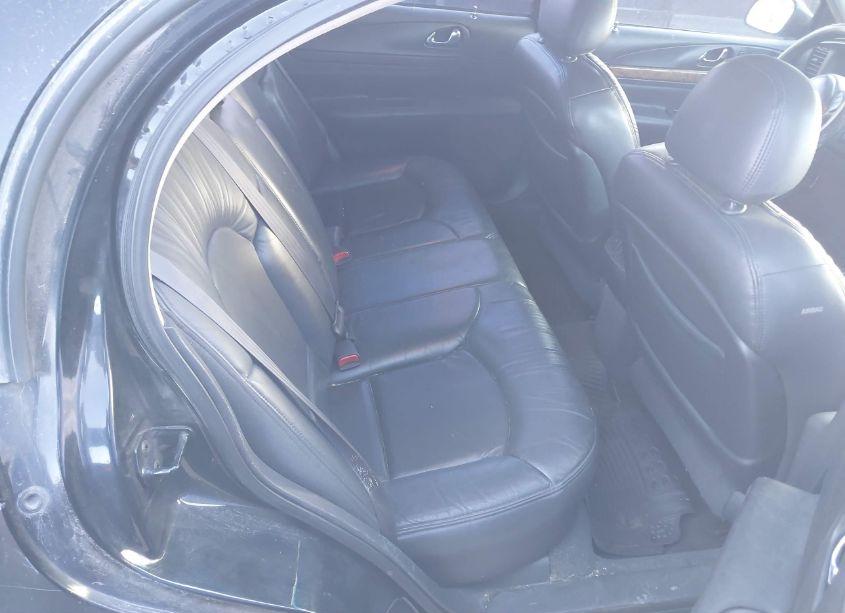 Photo 8 of 1999 Lincoln Continental (VIN 1LNHM97V0XY666957)