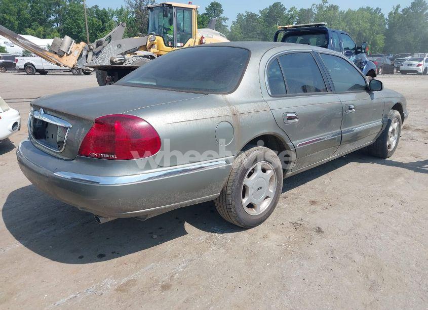 Photo 4 of 2000 Lincoln Continental (VIN 1LNHM97V0YY840446)
