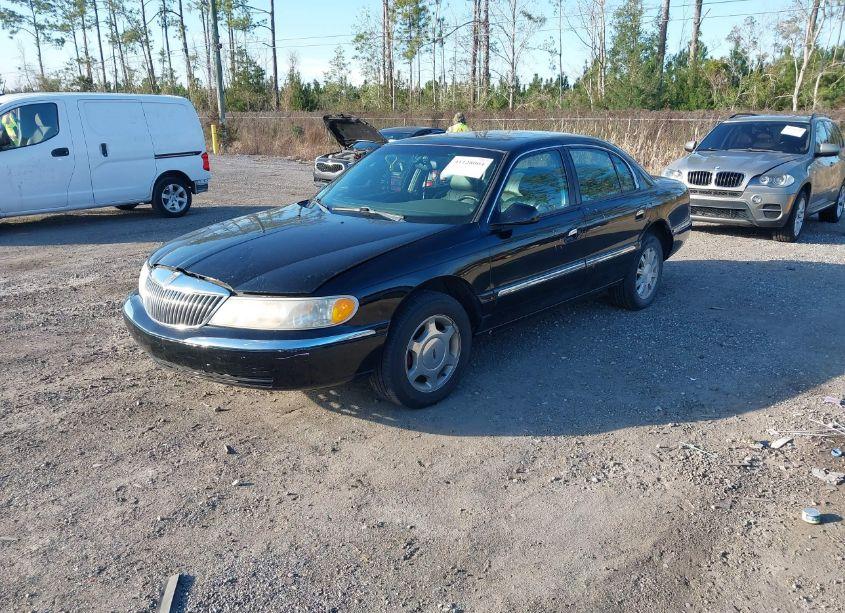 Photo 2 of 2000 Lincoln Continental (VIN 1LNHM97V1YY844621)