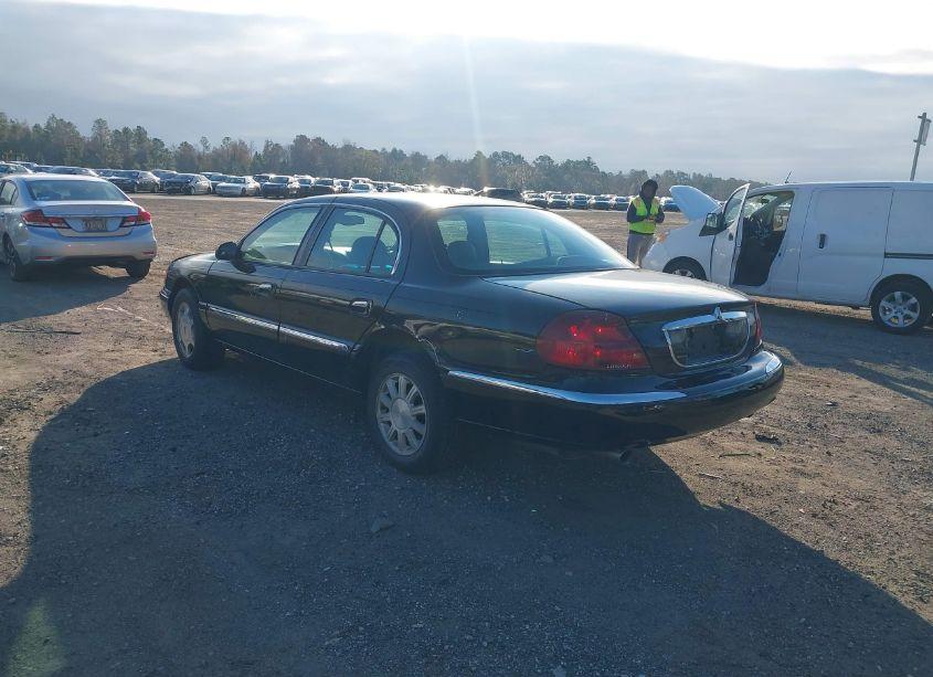 Photo 3 of 2000 Lincoln Continental (VIN 1LNHM97V1YY844621)