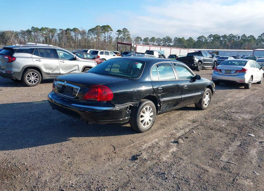 Photo 4 of 2000 Lincoln Continental (VIN 1LNHM97V1YY844621)