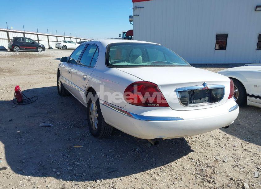 Photo 3 of 2000 Lincoln Continental (VIN 1LNHM97V2YY767189)