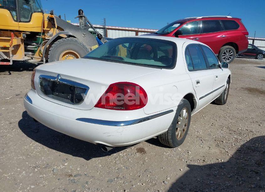 Photo 4 of 2000 Lincoln Continental (VIN 1LNHM97V2YY767189)