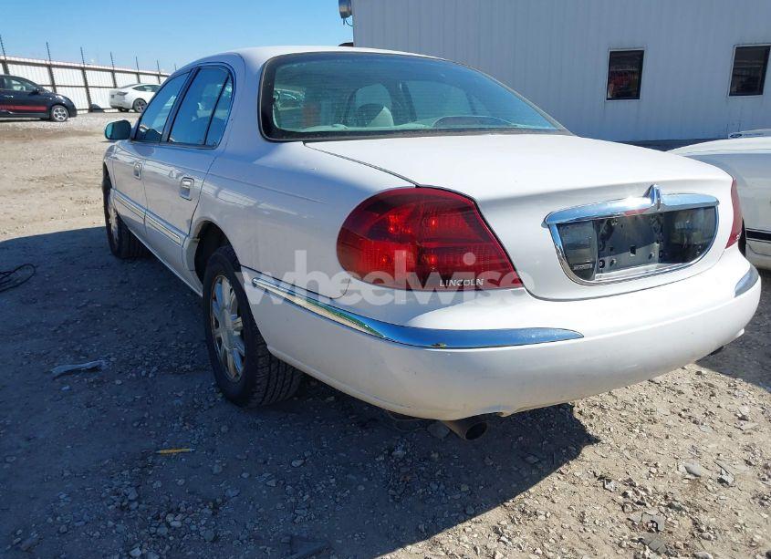 Photo 6 of 2000 Lincoln Continental (VIN 1LNHM97V2YY767189)