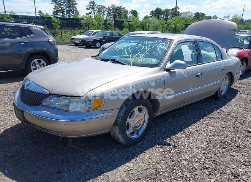Photo 2 of 2001 Lincoln Continental (VIN 1LNHM97V31Y638576)