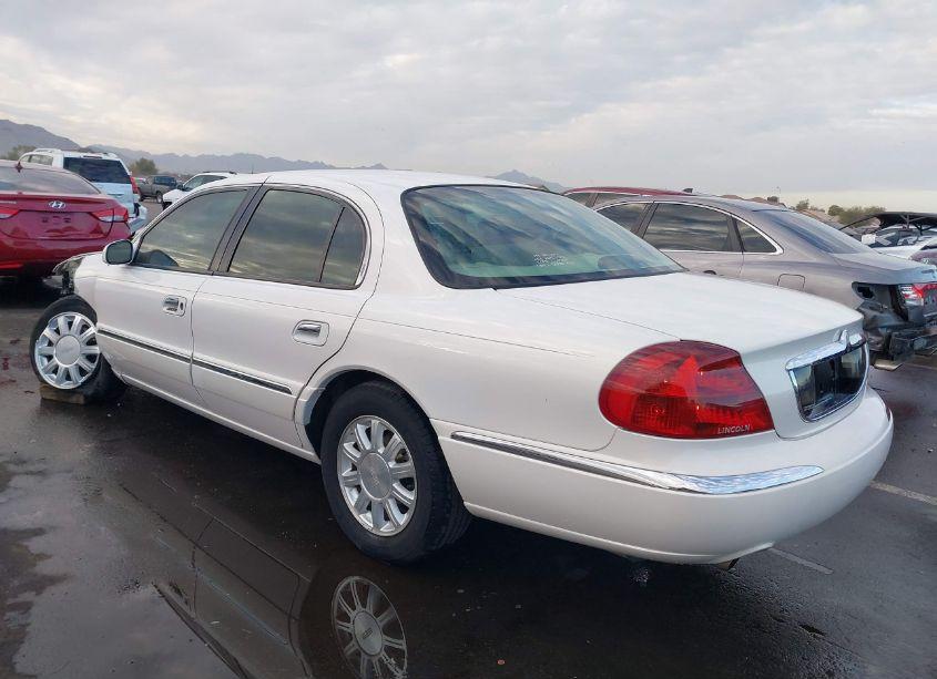 Photo 3 of 2000 Lincoln Continental (VIN 1LNHM97V3YY780002)