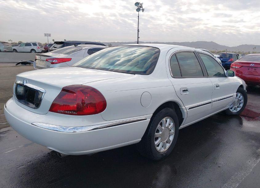 Photo 4 of 2000 Lincoln Continental (VIN 1LNHM97V3YY780002)