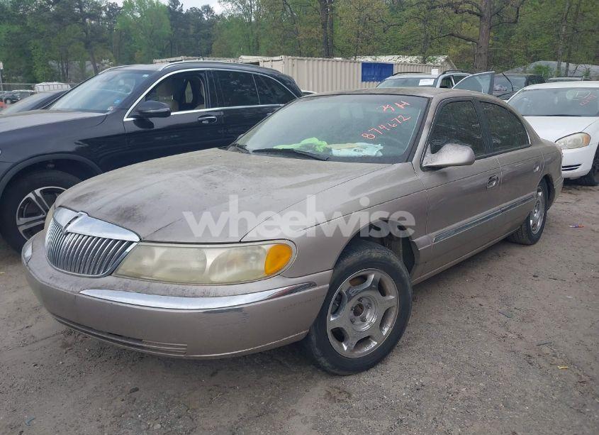 Photo 2 of 2000 Lincoln Continental (VIN 1LNHM97V3YY874672)