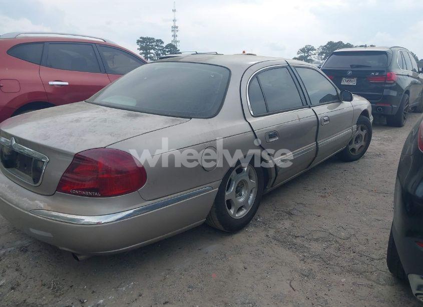 Photo 4 of 2000 Lincoln Continental (VIN 1LNHM97V3YY874672)