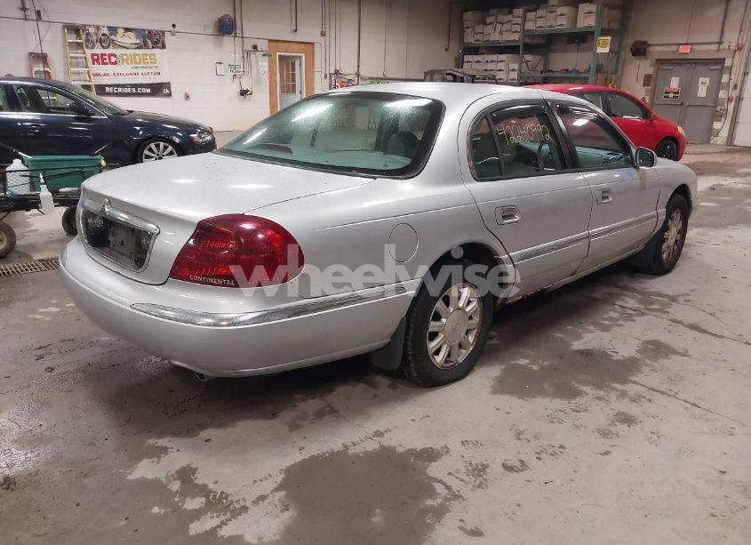Photo 4 of 2002 Lincoln Continental (VIN 1LNHM97V62Y621823)